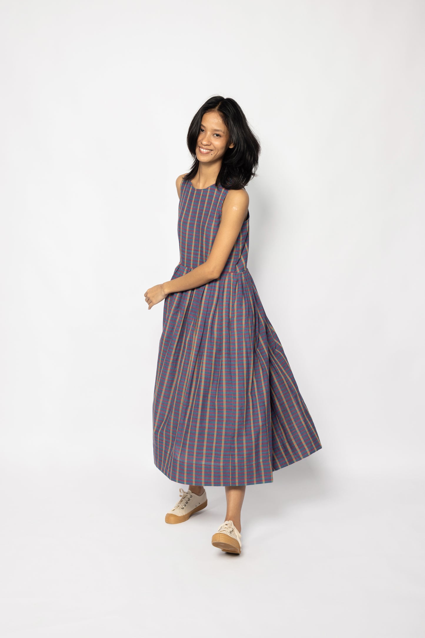 Plains Design Ralfi Dress – full-length front view of handwoven cotton stripe sleeveless midi dress with easy shape silhouette, styled with flat shoes