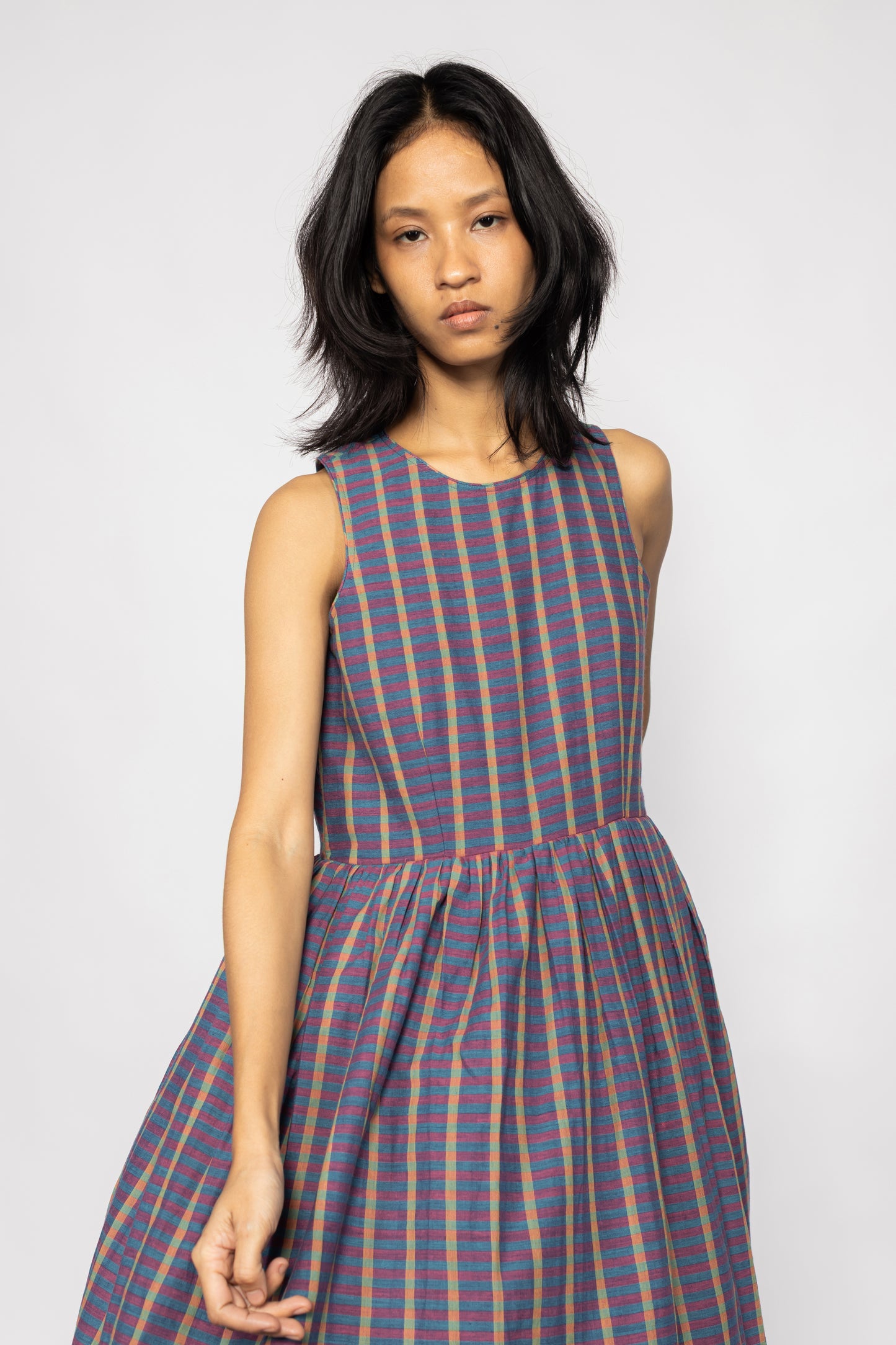Plains Design Ralfi Dress – handwoven handspun cotton sleeveless dress in multicolour stripe, relaxed easy shape, front view close-up