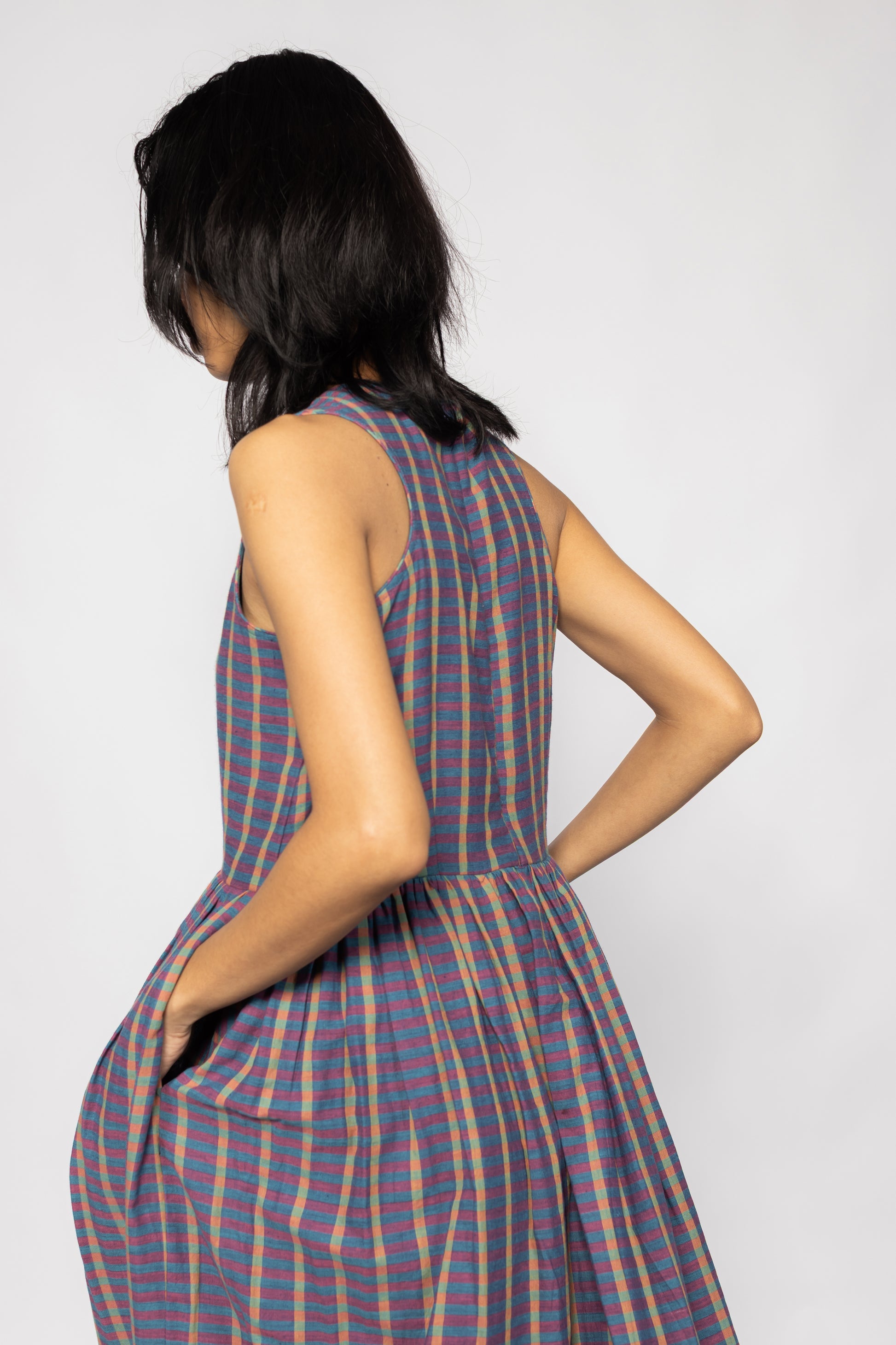Plains Design Ralfi Dress – three-quarter back view of handwoven cotton sleeveless stripe dress with racer back detail
