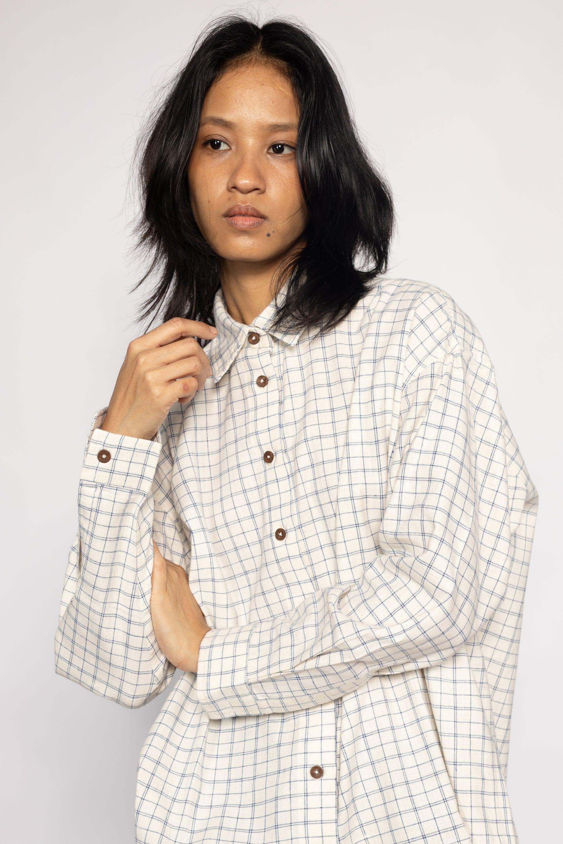 Plains Design Letter Shirt – close-up of wooden button placket and handwoven cotton check fabric detail